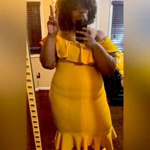 Ruffle shoulder and bottom dress! Beautiful color!